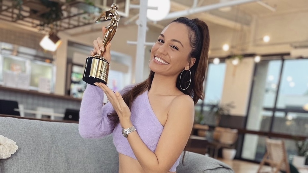 Dariany Santana with Telly Awards for Wags to Riches